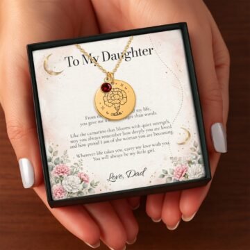 Detailed carnation Moon and Bloom pendant with garnet-colored accent