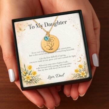 Detailed daffodil Moon and Bloom pendant with aquamarine-colored accent